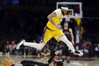 Los Angeles, CA - January 03: Lakers power forward Anthony Davis, #3, grabs a loose ball.