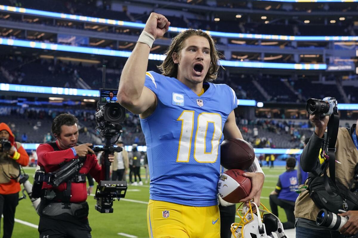 Chargers quarterback Justin Herbert celebrates after a win over the Miami Dolphins on Dec. 11.