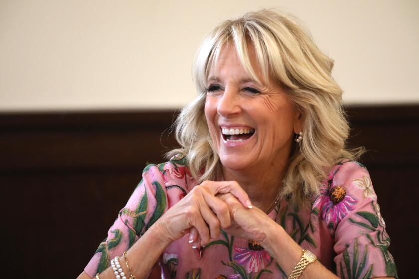 LOS ANGELES, CA - SEPTEMBER 16, 2022 - - First Lady Jill Biden enjoys a light moment while visiting Homegirl Cafe to mark what Biden's office says is Homeboy Industries, "on-the-job training and wraparound services, empowering individuals to enter the workforce within its rehabilitation and re-entry program," in Los Angeles on September 16, 2022. The First Lady met with employees in the Homeboy Bakery and spoke with some who benefited from the work force development program and college pathways program provided by Homeboy Industries. (Genaro Molina / Los Angeles Times)