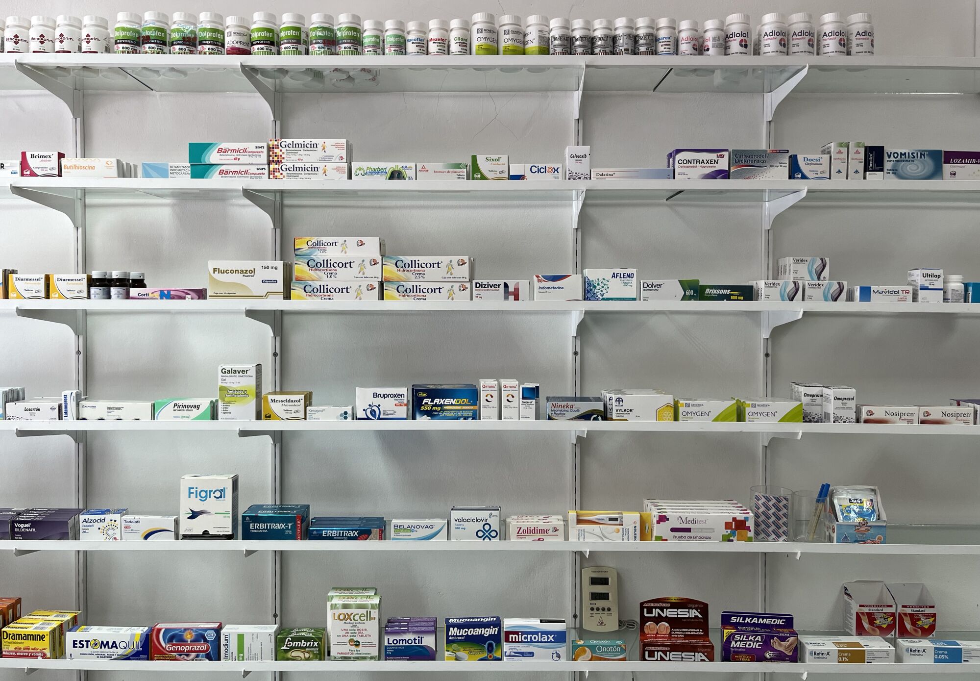 Individual packages of medication line store shelves.