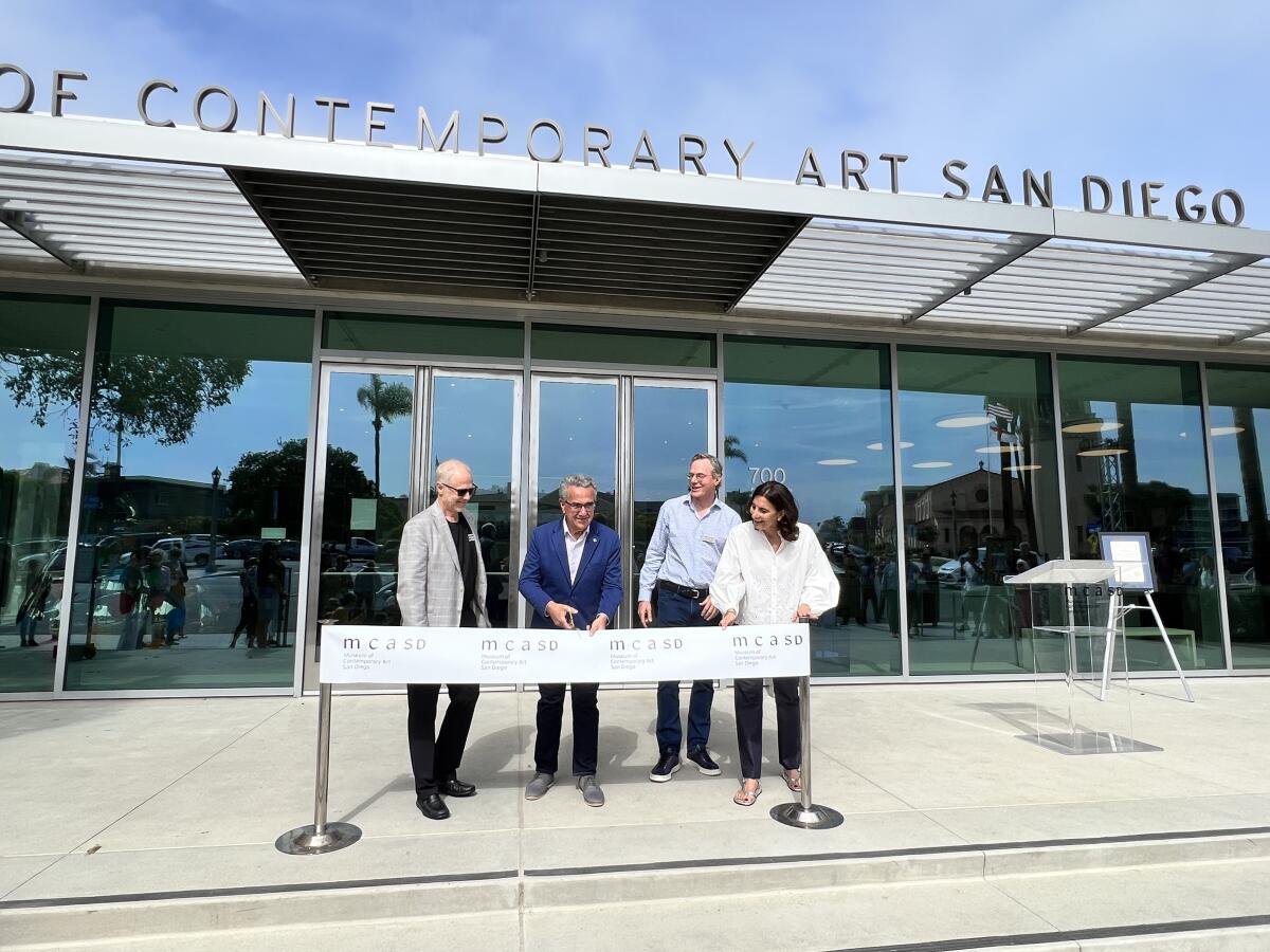 Grant Oliphant, Joe LaCava, Paul Jacobs and Kathryn Kanjo cut the ribbon ahead of opening MCASD to the public April 9.