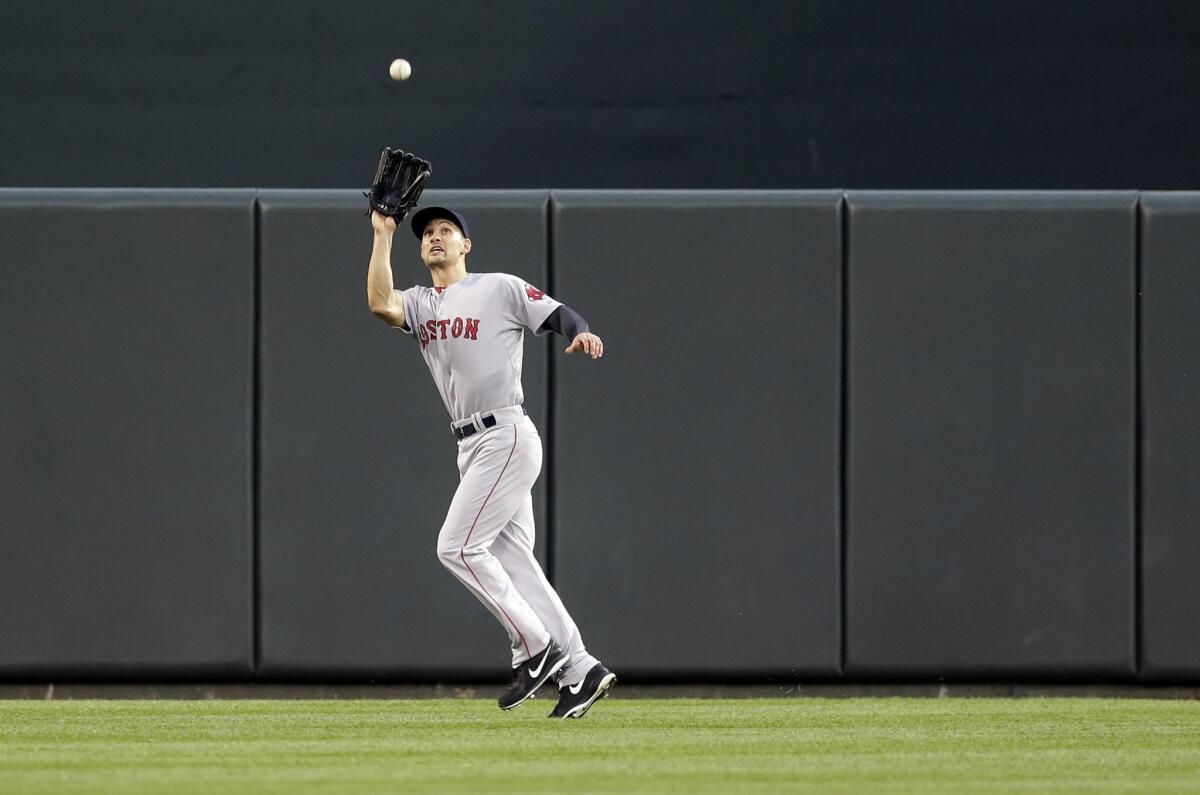 Boston Red Sox's Grady Sizemore prepares to catch a fly ball during a game against the Baltimore Orioles on Tuesday.