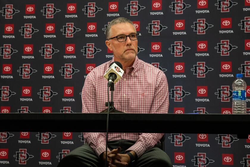 San Diego, CA - August 29: San Diego State University Football Head Coach Brady Hoke and SDSU Director of Athletics John David Wicker speak at a news conference regarding rape allegations against three SDSU football players at San Diego State University in San Diego, CA on Monday, Aug. 29, 2022. (Adriana Heldiz / The San Diego Union-Tribune)