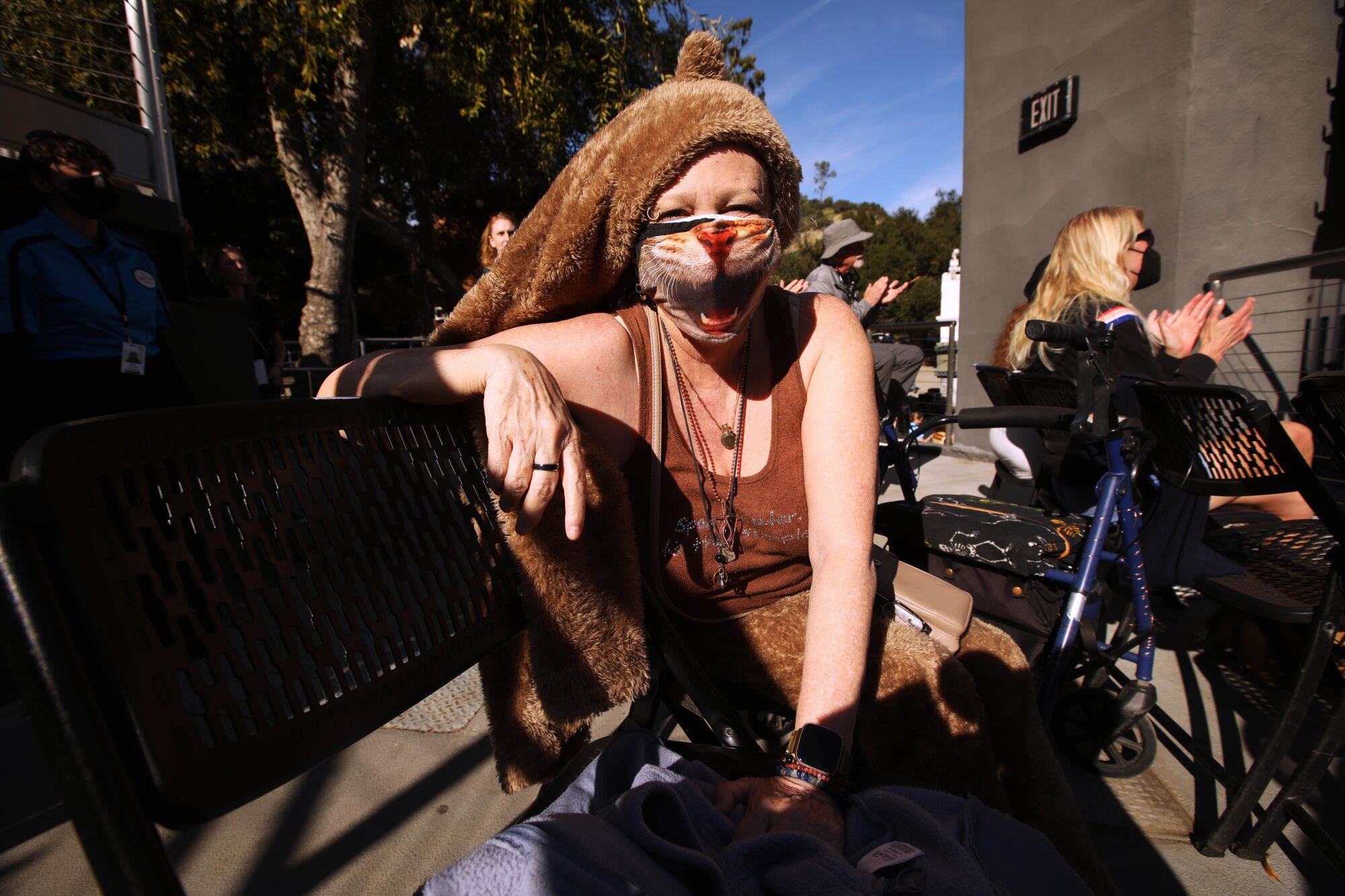 Jennifer Johnson wearing a cougar costume attends the "celebration of life" for P-22 at the Greek Theater.