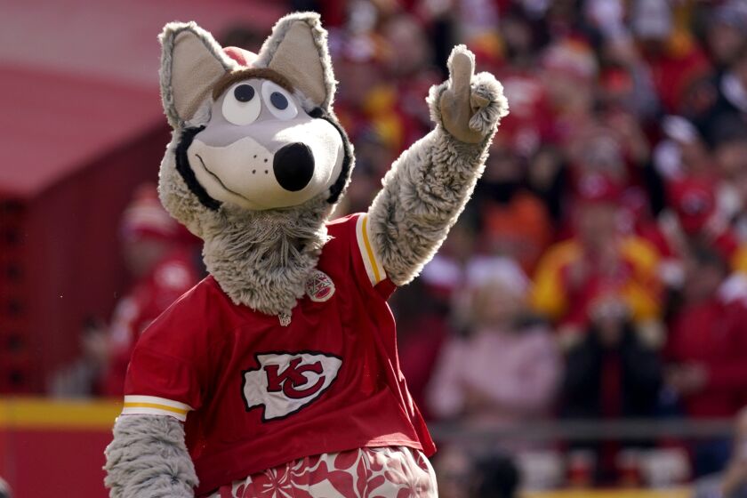 Kansas City Chiefs mascot KC Wolf motivates fans during the first half of the AFC championship NFL football game