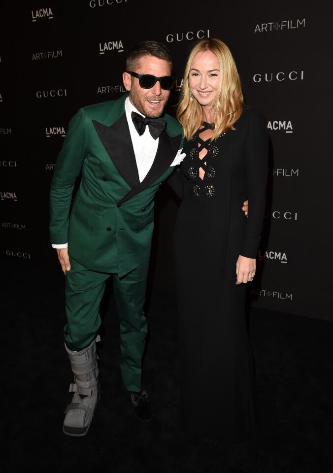 Lapo Elkann, left, and Gucci Creative Director Frida Giannini attend the 2014 LACMA Art + Film Gala honoring Barbara Kruger and Quentin Tarantino presented by Gucci at LACMA on Nov. 1.