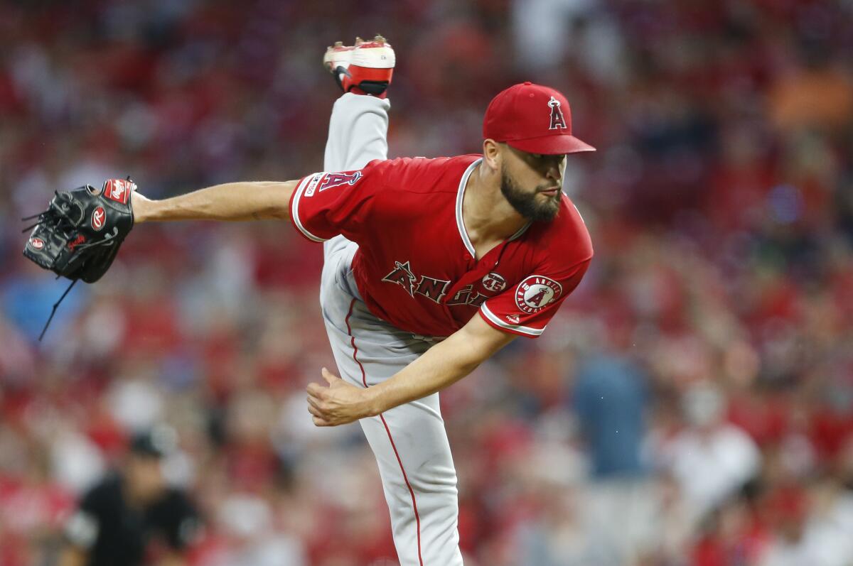 Angels reliever Patrick Sandoval delivers during Monday's game against the Cincinnati Reds.