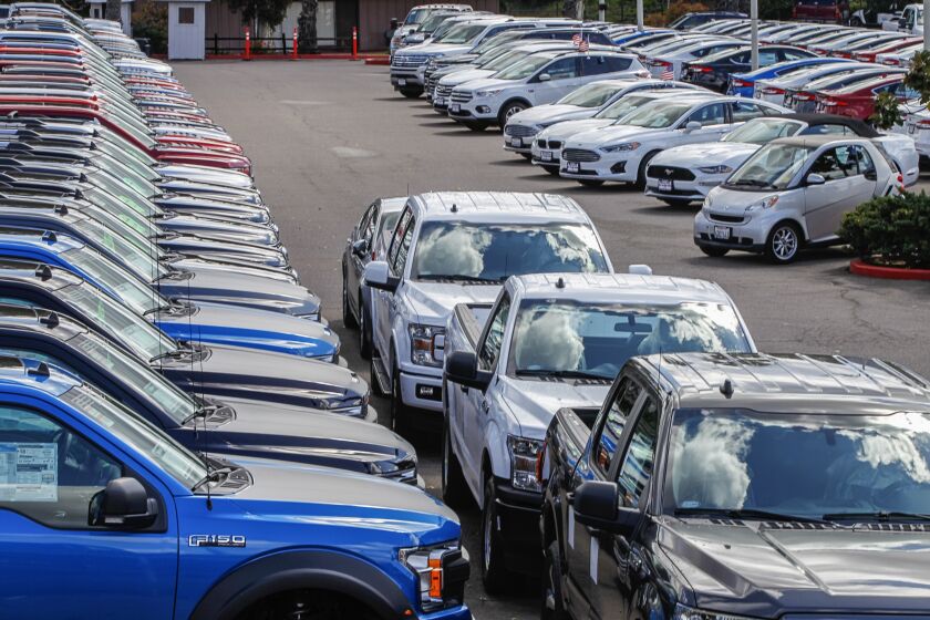 The new car lot at El Cajon Ford sits idle because the Sales Department at the business is closed due to the Coronavirus COVID-19 pandemic and the stay at home orders on March 27, 2020 in El Cajon, California. A limited crew of staff is still working in the service department to work on cars.