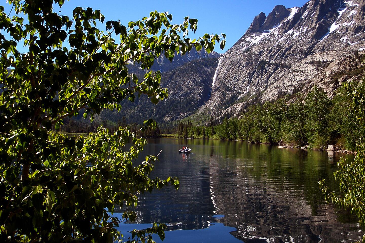 The grand setting of Gull Lake makes for relaxing days in the area around June Lake, Calif. Feel like enjoying the scenery from the lake? Boat rentals are available.