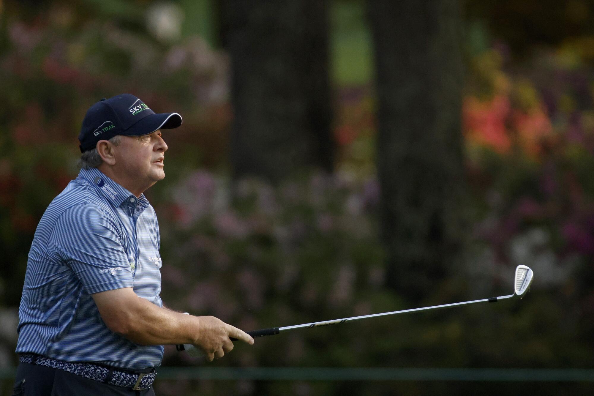 Ian Woosnam watches his shot