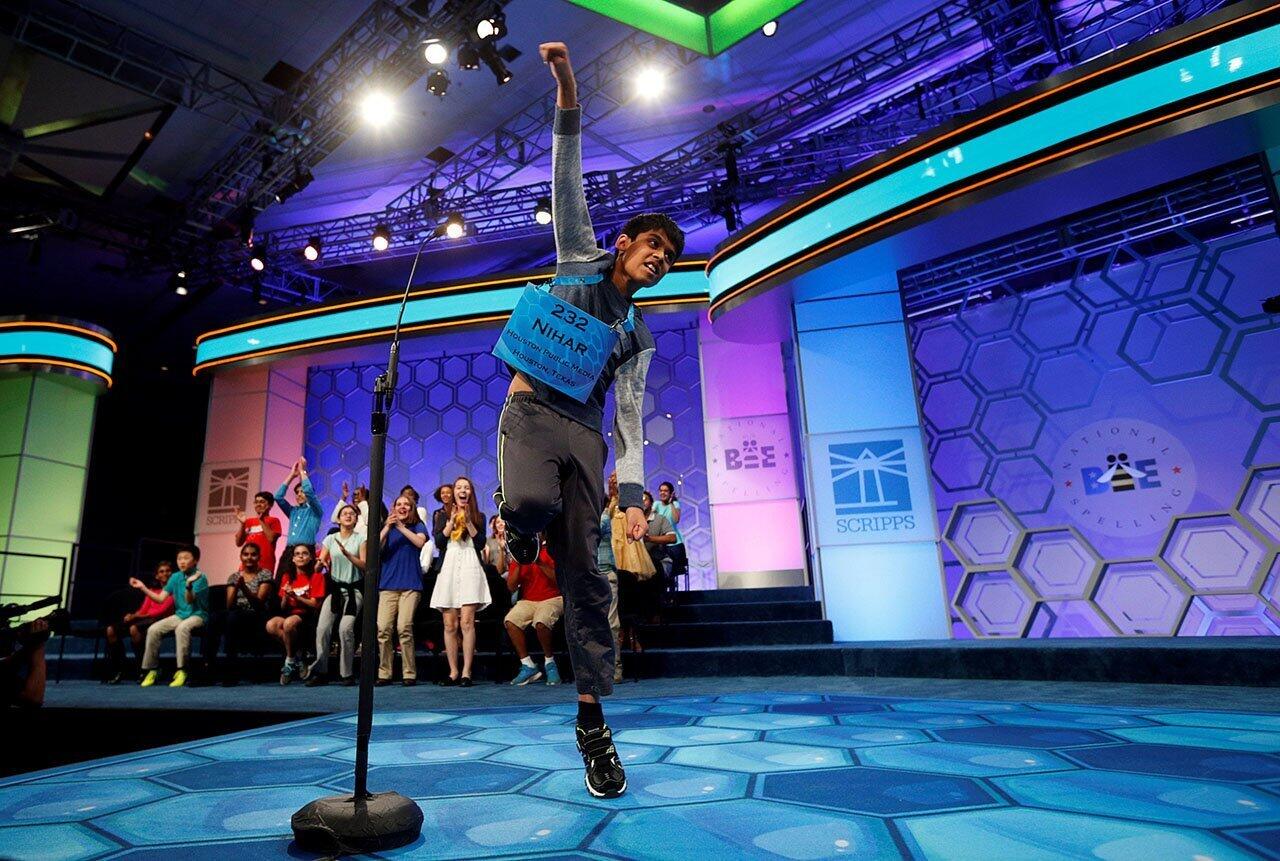 Nihar Saireddy Janga of Austin, Texas, leaps for joy upon spelling the last word to become a co-champion in the final round of Scripps National Spelling Bee at National Harbor in Maryland. Janga shared the win with Jairam Jagadeesh Hathwar of Painted Post, New York.