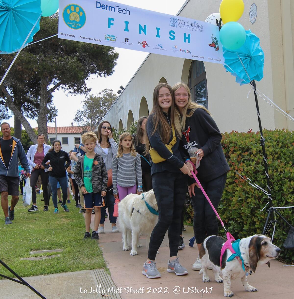 The inaugural La Jolla Mutt Strut drew about 100 dogs and their owners to The Village in 2022. This year's event is May 13.