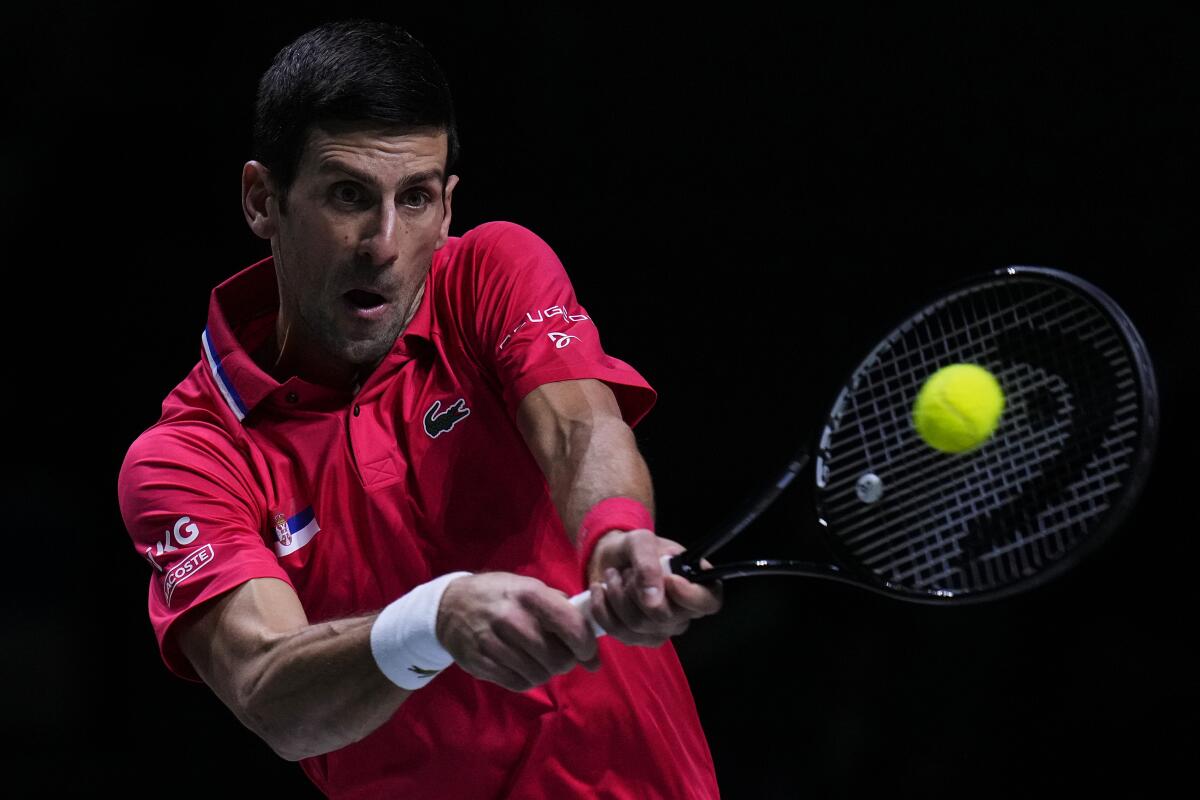 Serbia's Novak Djokovic returns the ball to Kazakhstan's Alexander Bublik.