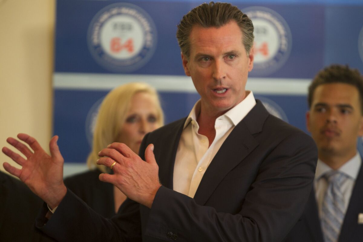 California Lt. Gov. Gavin Newsom speaks at news conference supporting Proposition 64, the Adult Marijuana Act, at Liberty Station on Oct. 13. (John Gibbins / San Diego Union-Tribune)
