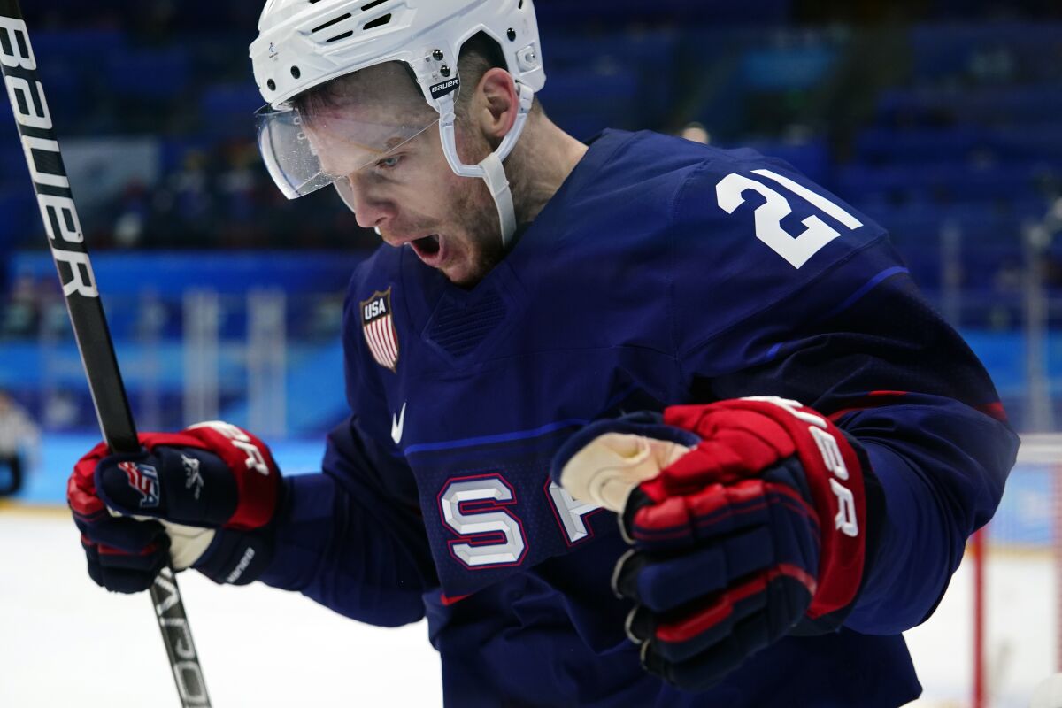 United States' Brian Oneill celebrates after scoring a goal against China during a preliminary round men's hockey game at the 2022 Winter Olympics, Thursday, Feb. 10, 2022, in Beijing. (AP Photo/Matt Slocum)