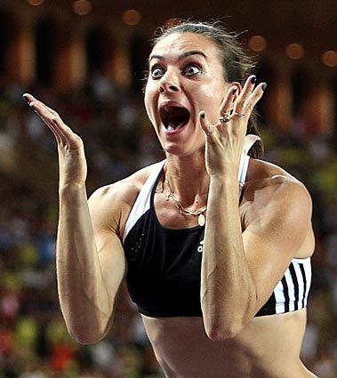 Russia's Yelena Isinbayeva reacts after breaking the world record with 5.04 meters during the pole vault event at the Monaco Grand Prix international athletics meeting in Monaco.