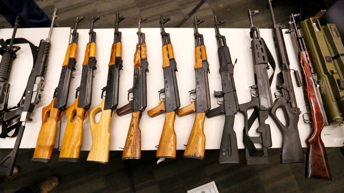 Some of the nearly 800 guns, including AK-47s and an anti-tank launcher, turned in at a recent LAPD gun buyback.