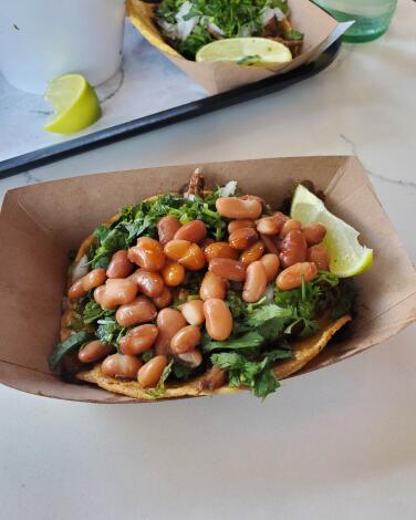 Birria taco with beans at Tuétano Taquería.