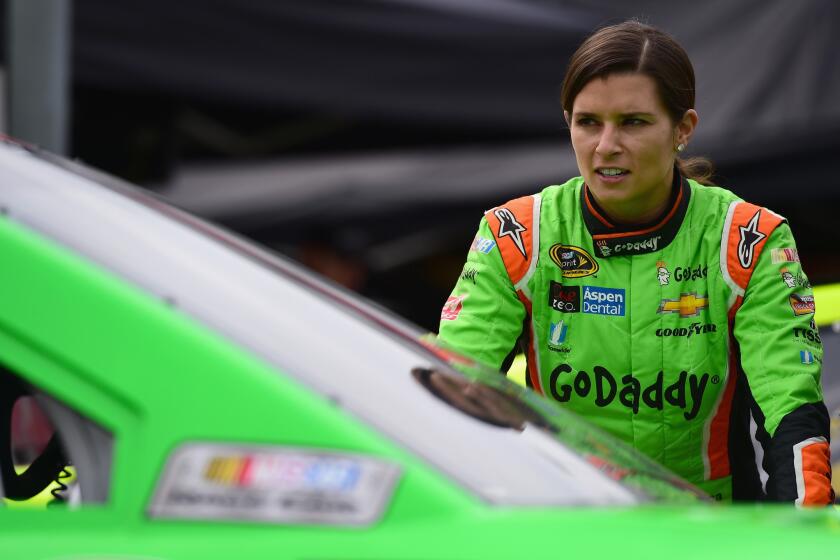 Danica Patrick stands on the grid during qualifying for the Food City 500 at Bristol Motor Speedway on Friday. Patrick finished ninth in Sunday's race.