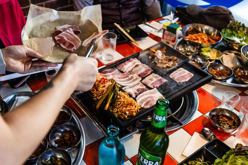 Los Angeles, CA - March 19: Kteam Korean BBQ restaurant on Tuesday, March 19, 2024 in Los Angeles, CA. (Jason Armond / Los Angeles Times)