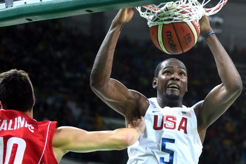U.S. forward Kevin Durant dunks the ball during a game against Serbia on Aug. 12.