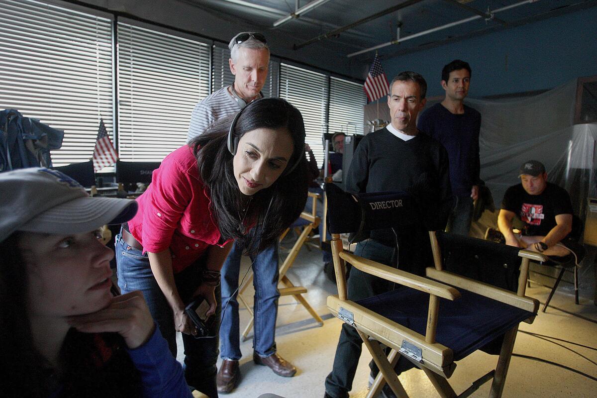 A production crew at Santa Clarita Studios in Santa Clarita holds court in February 2013.
