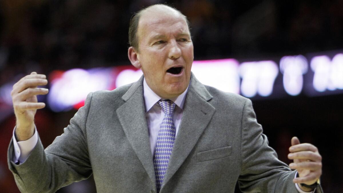 Former Lakers and Clippers Coach Mike Dunleavy reacts to a call in the fourth quarter of a Clippers game against the Cavaliers on Jan. 31, 2010.