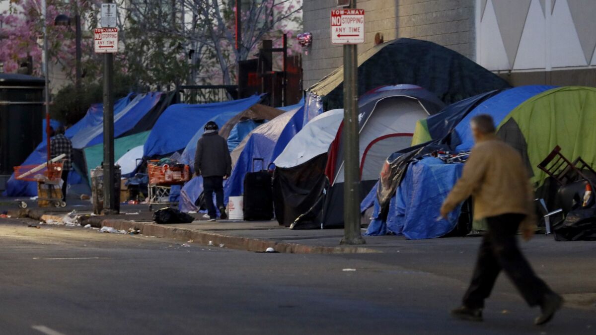 Tents line the sidewalks near East 5th and San Pedro streets in Los Angeles' skid row on Feb. 15.