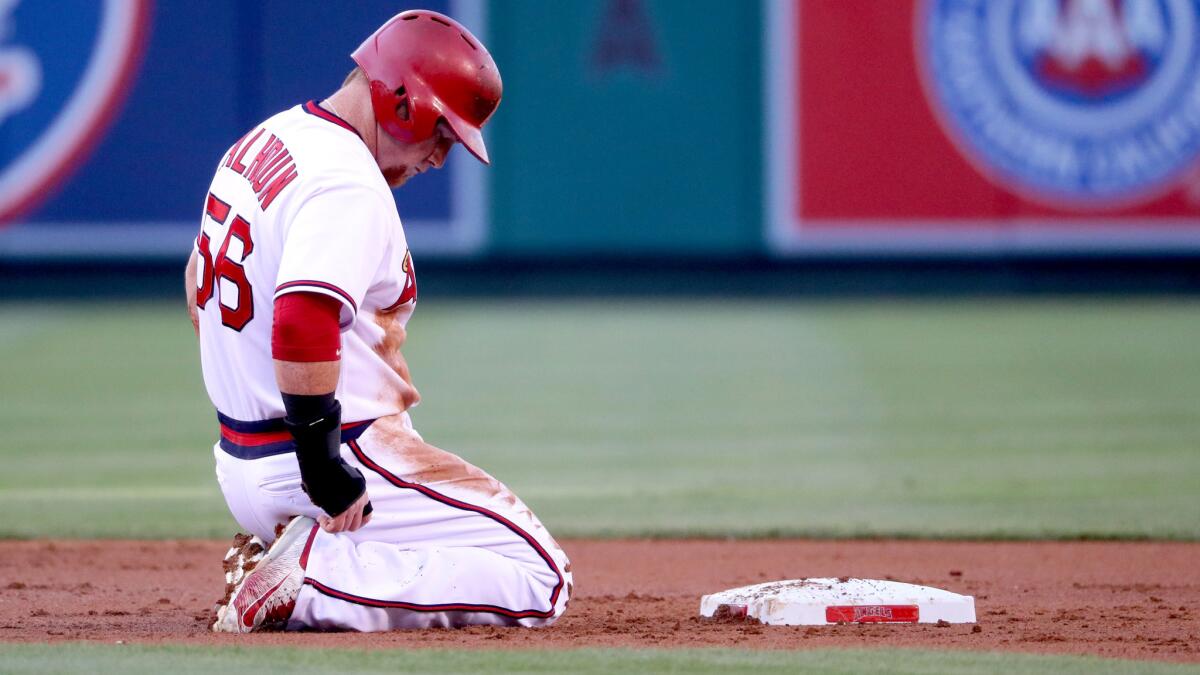 Angels right fielder Kole Calhoun reacts after getting picked off second base during a recent game.