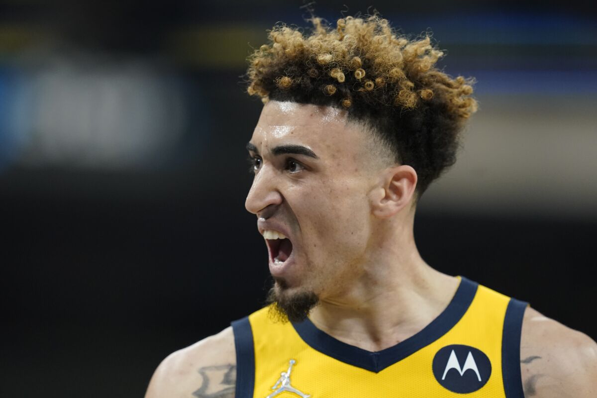 Indiana Pacers' Chris Duarte reacts during the first half of the team's NBA basketball game against the Cleveland Cavaliers, Friday, Feb. 11, 2022, in Indianapolis. (AP Photo/Darron Cummings)