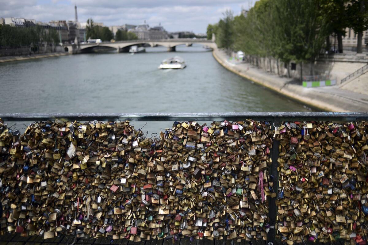 Love locks on Pont des Arts before being removed in Paris.