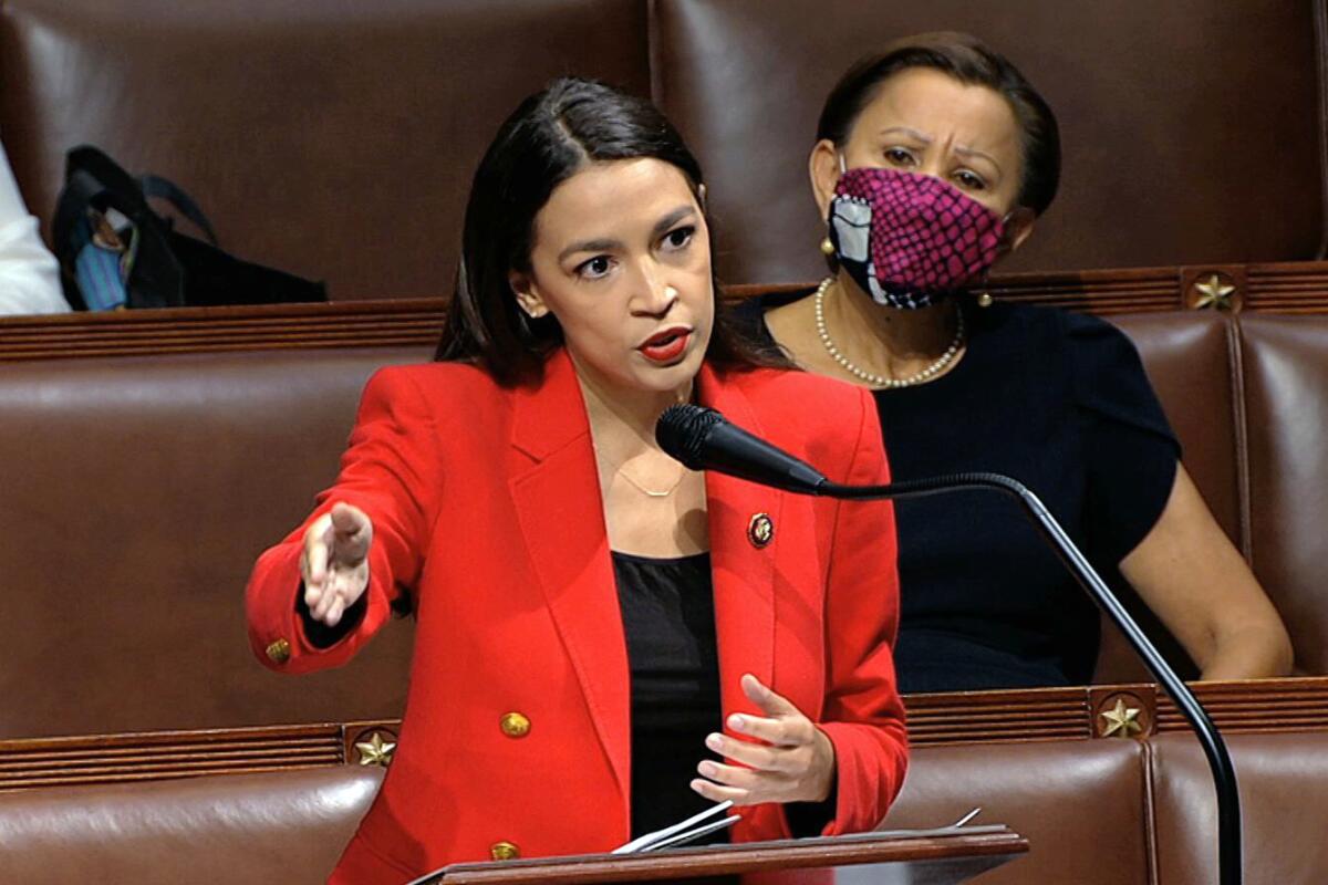 In this image from video, Rep. Alexandria Ocasio-Cortez speaks on the House floor Thursday. 