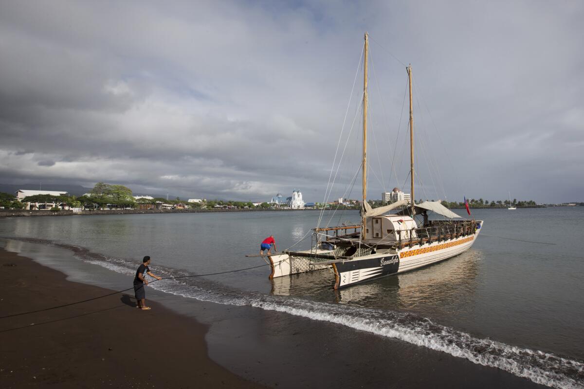 Boat coming ashore in Samoa