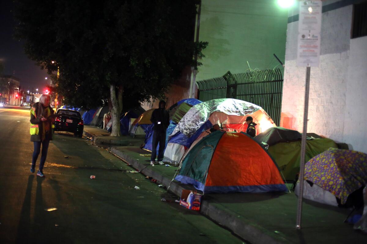 Volunteer Barbara Petersmeyer counts homeless during a three-day 2019 Greater Los Angeles Homeless Count last January in Los Angeles.