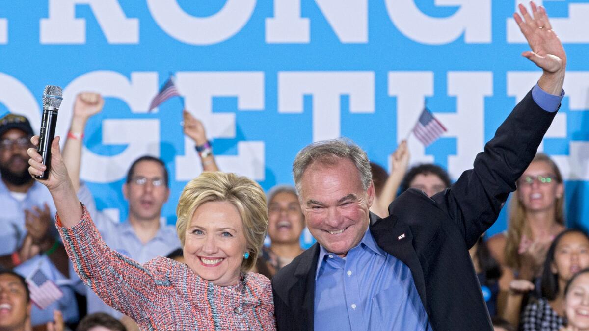 Hillary Clinton and Virginia Sen. Tim Kaine, shown campaigning in his home state this month, appeared together Saturday for the first time as the Democratic ticket for the White House.