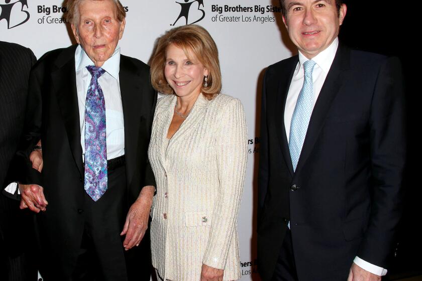 Executive compensation for Viacom Executive Chairman Sumner Redstone fell 85% in fiscal 2015 to $2 million. Above, Redstone, left, daughter Shari Redstone, who is Viacom's vice chair, and Viacom CEO Philippe Dauman.