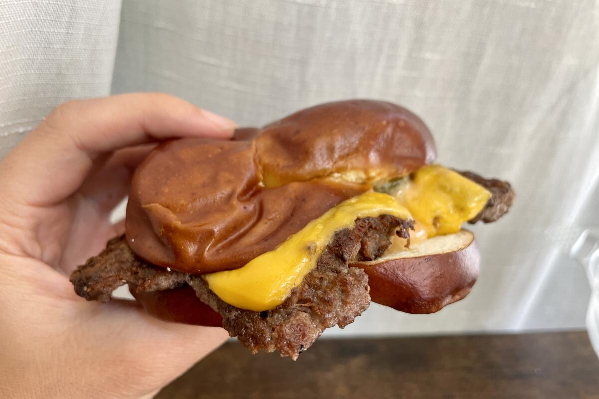 The Wednesday-only pretzel smash burger from Rockenwagner Bakery.