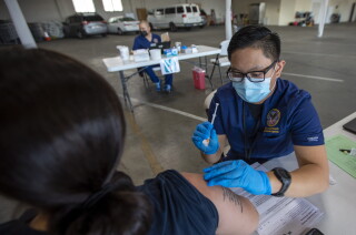 Santa Barbara County among 5 joining orange tier as
California's reopening continues 2 GARDENA, CA - APRIL 17: Registered nurse Justine Bertulano, right, gives Yolanda Estrada-Saporito, left, of Garden Grove, her second Moderna vaccination on Saturday, April 17, 2021 in Gardena, CA. It was very quiet at the time she received her dose she was the only patient. There were 38 people who received their vaccination here today. VA Long Beach, in collaboration with the Dae Hueng Presbyterian Church of Gardena, hosted a vaccination event for veterans, their spouses and caregivers. It'll be the first of two events to give out both doses of the Moderna Vaccine. It's also the first time the VA is vaccinating spouses and caregivers. (Francine Orr / Los Angeles )