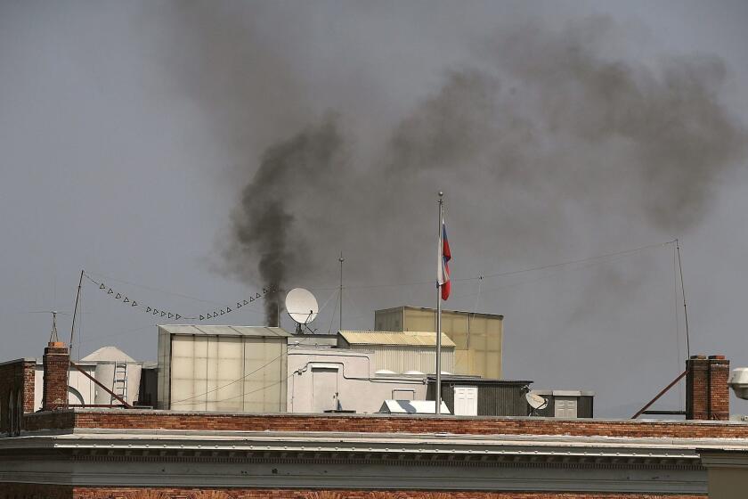 SAN FRANCISCO, CA - SEPTEMBER 01: Black smoke billows from a chimney on top of the Russian consulate on September 1, 2017 in San Francisco, California. In response to a Russian government demand for the United States to cut its diplomatic staff in Russia by 455, the Trump administration ordered the closure of three consular offices in the San Francisco, New York and Washington. (Photo by Justin Sullivan/Getty Images) ** OUTS - ELSENT, FPG, CM - OUTS * NM, PH, VA if sourced by CT, LA or MoD **