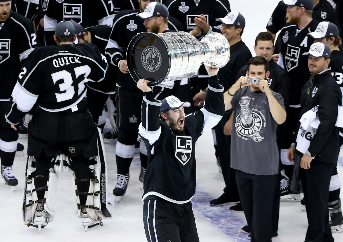 Drew Doughty celebrates with the Stanley Cup following the Kings' win over the New York Rangers.
