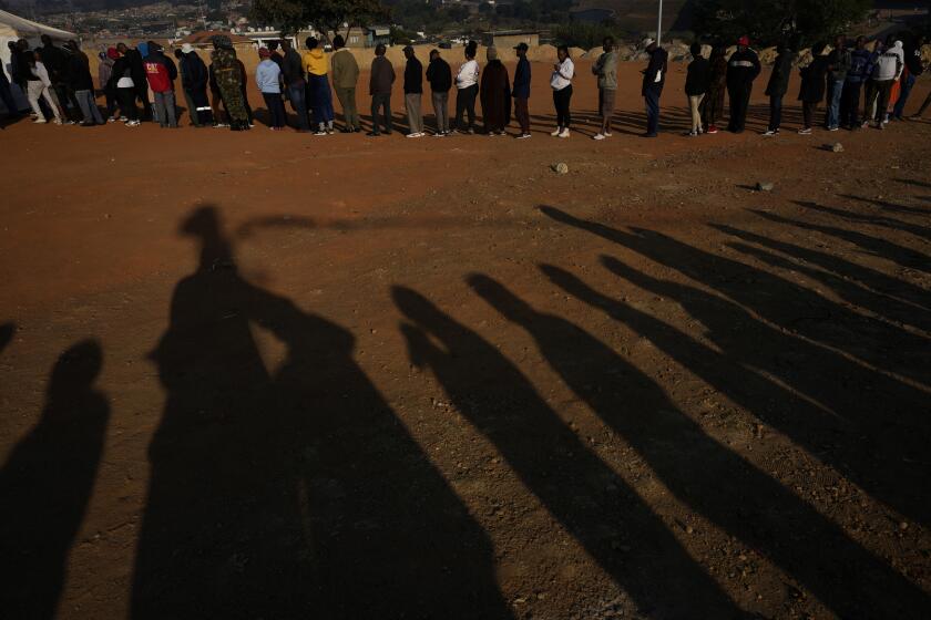 Voters line up to cast their ballot for general election in Alexandra, near Johannesburg, South Africa, Wednesday, May 29, 2024. (AP Photo/Themba Hadebe)