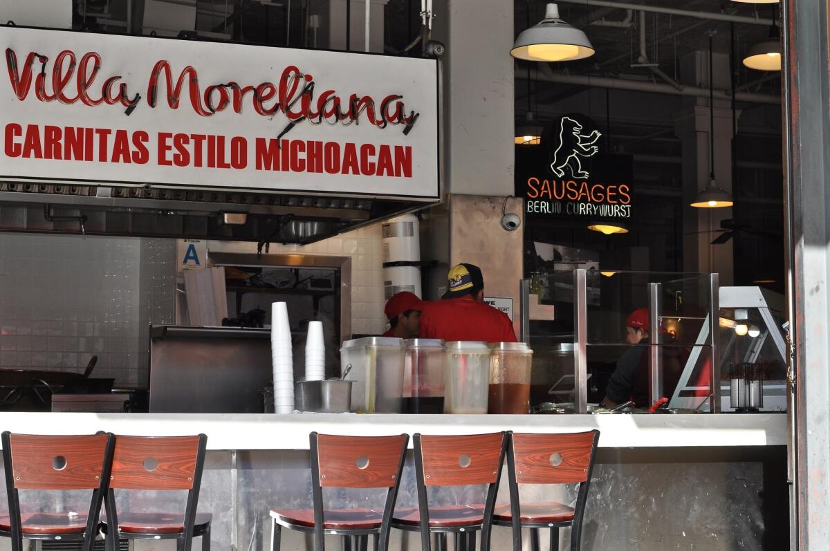 Villa Moreliana, the Michoacan carnitas stall at Grand Central Market, starts serving micheladas and an evening menu of updated Mexican dishes Tuesday night.