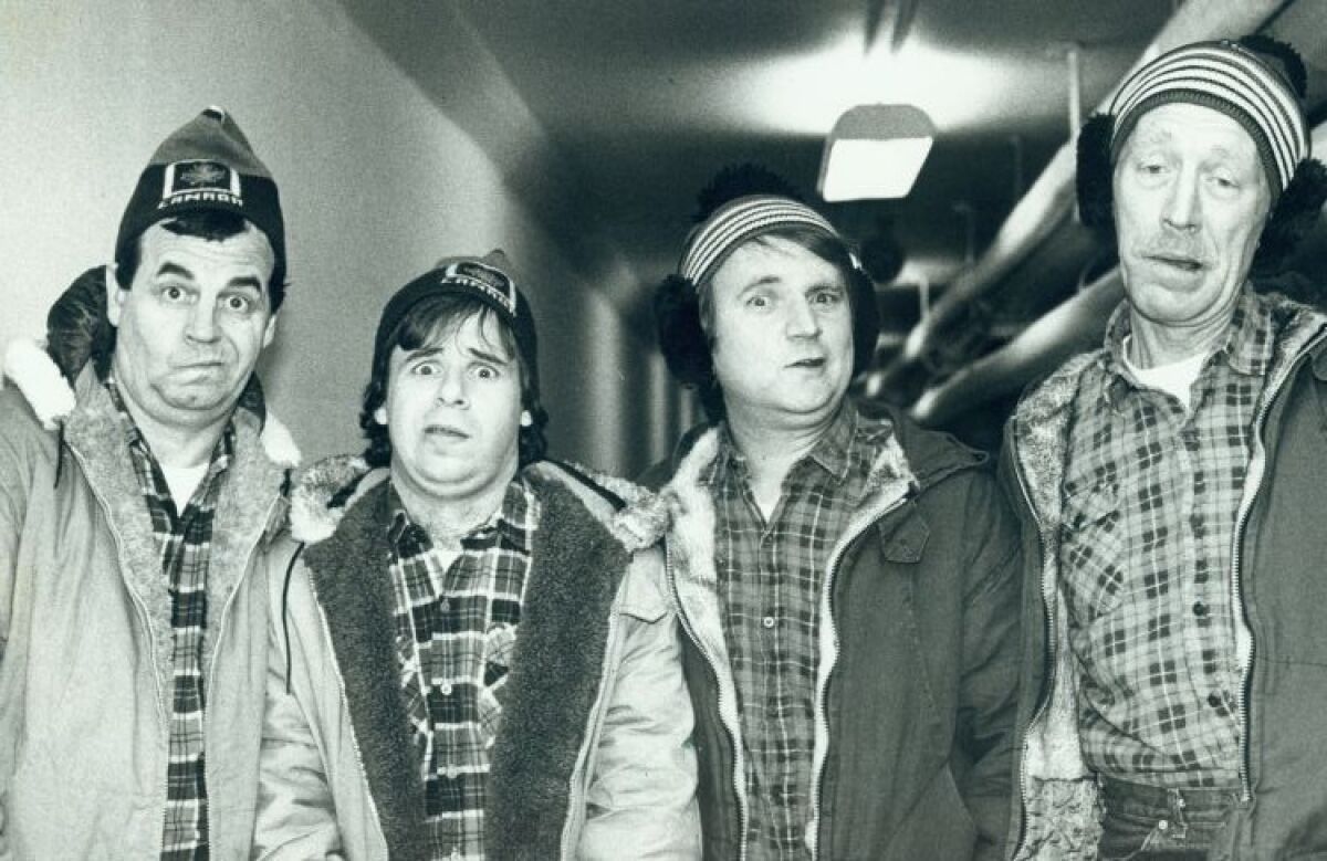 Paul Dooley, Rick Moranis, Dave Thomas and Max von Sydow in the movie "Strange Brew."