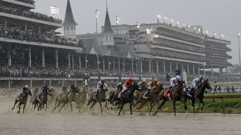 cavalos correm durante a 144ª corrida do Kentucky Derby em 5 de Maio de 2018, em Churchill Downs.