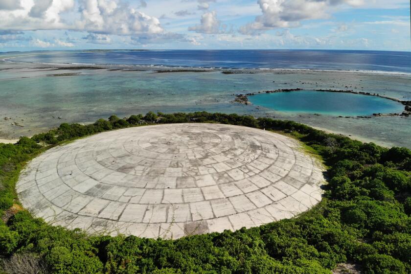 RUINIT, MARSHALL ISLANDS--MAY 27, 2019--The U.S. Department of Energy has disclosed high levels of radiation in giant clams in a lagoon near the Runit Dome, where the U.S. entombed radioactive waste from U.S. nuclear testing in the Marshall Islands almost four decade ago. (Carolyn Cole/Los Angeles Times)