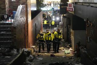 Police officers inspect the scene where people died and were injured in Seoul.