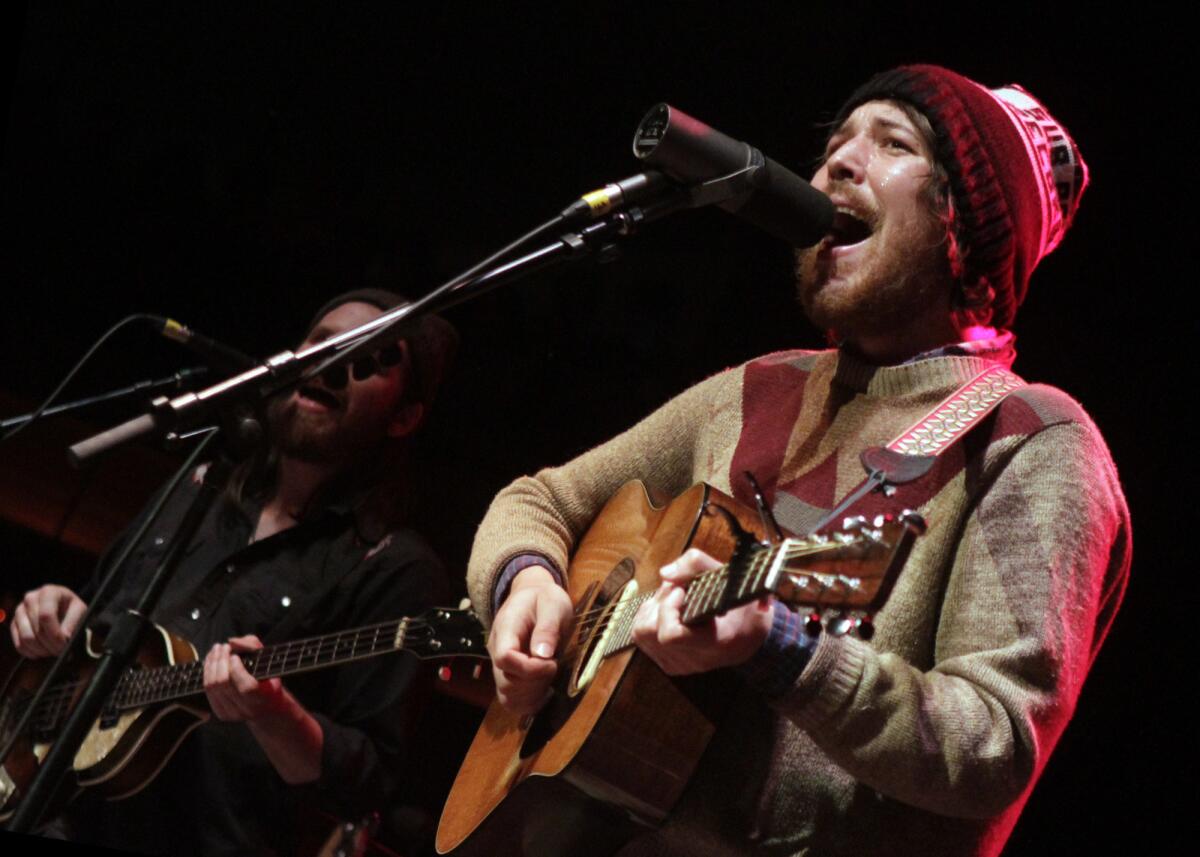 Fleet Foxes' Robin Pecknold, foreground, and Christian Wargo.