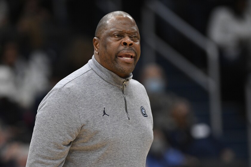 FILE - Georgetown head coach Patrick Ewing reacts during the first half of an NCAA college basketball game against Syracuse, Saturday, Dec. 11, 2021, in Washington. Georgetown men's basketball coach and former NBA star Patrick Ewing will miss the Hoyas' game against visiting Butler because of what the team said Wednesday, Jan. 12, 2022 was D.C. Department of Health guidelines.(AP Photo/Nick Wass, File)