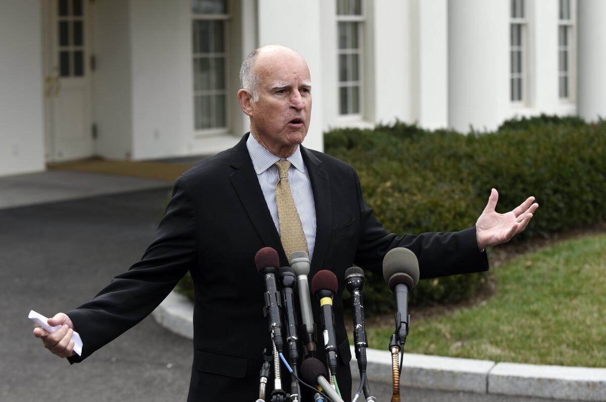 Gov. Jerry Brown, pictured speaking to reporters outside the White House earlier this month, said in a "Meet the Press" interview that he'd be running for president if he was younger.