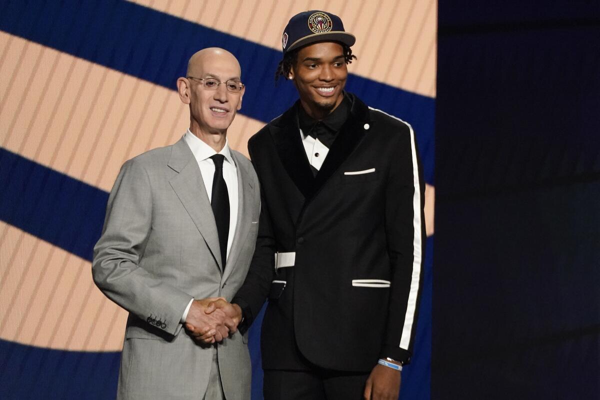 Ziaire Williams poses for a photo with NBA Commissioner Adam Silver.